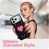Reovo Bow Hoesje - Geschikt voor iPhone 17 Pro Max - Hartvormige Zuignap Grip & Telefoonstandaard - Zwart/Roze
